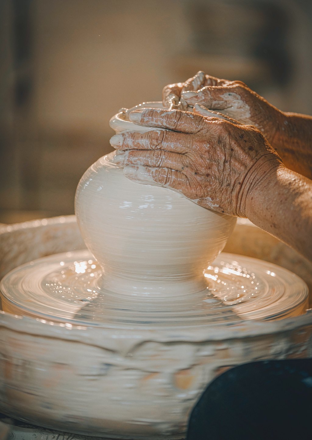 Master potter at the wheel