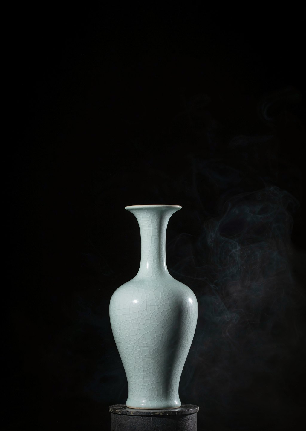 Celadon porcelain vase on dark background
